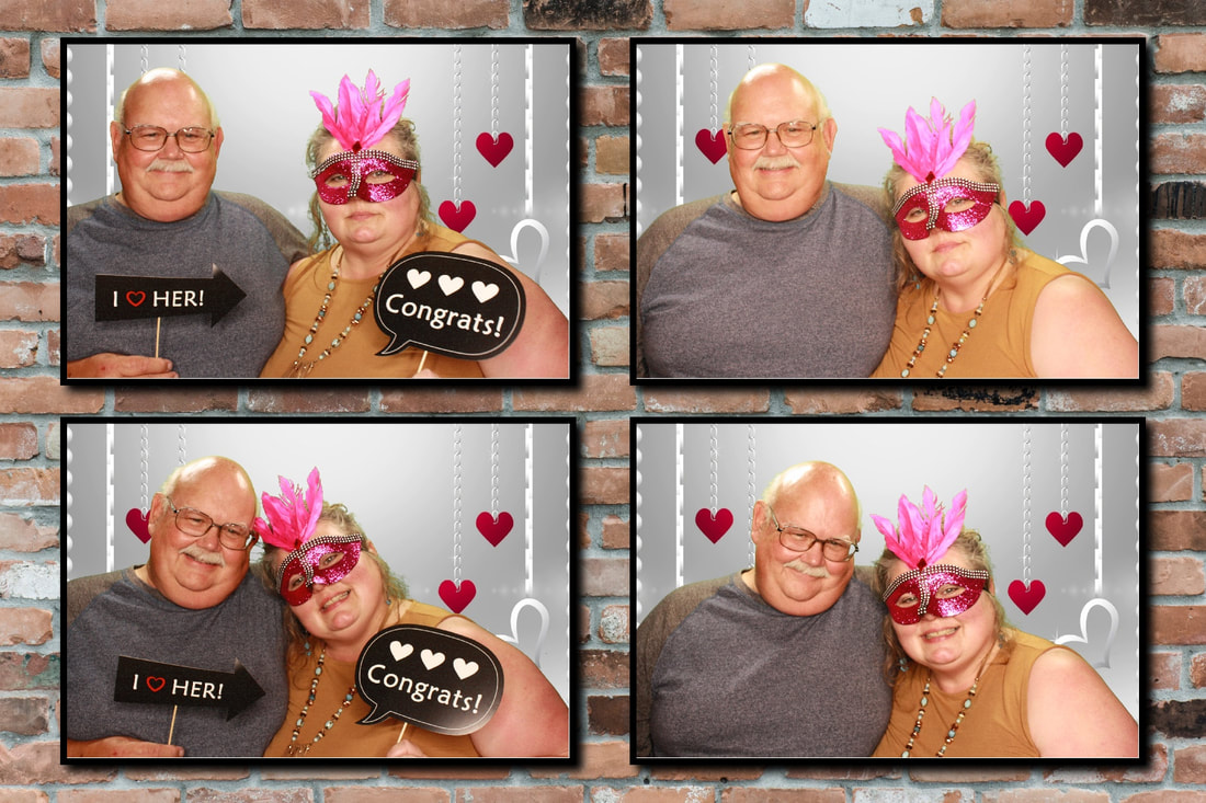 Wedding guests photobooth pictures in front of heart background